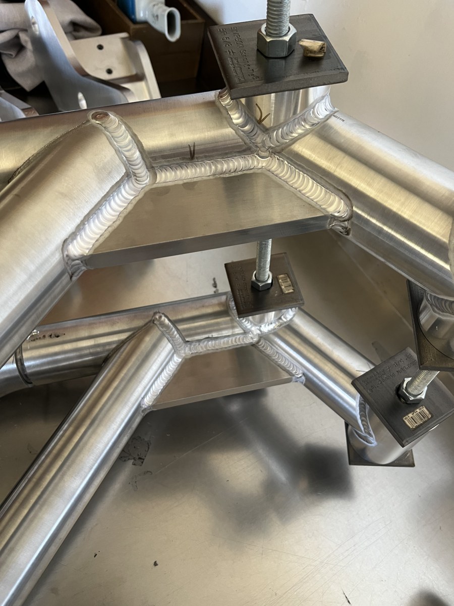 Fitted and welded tube joints in a fabricated assembly